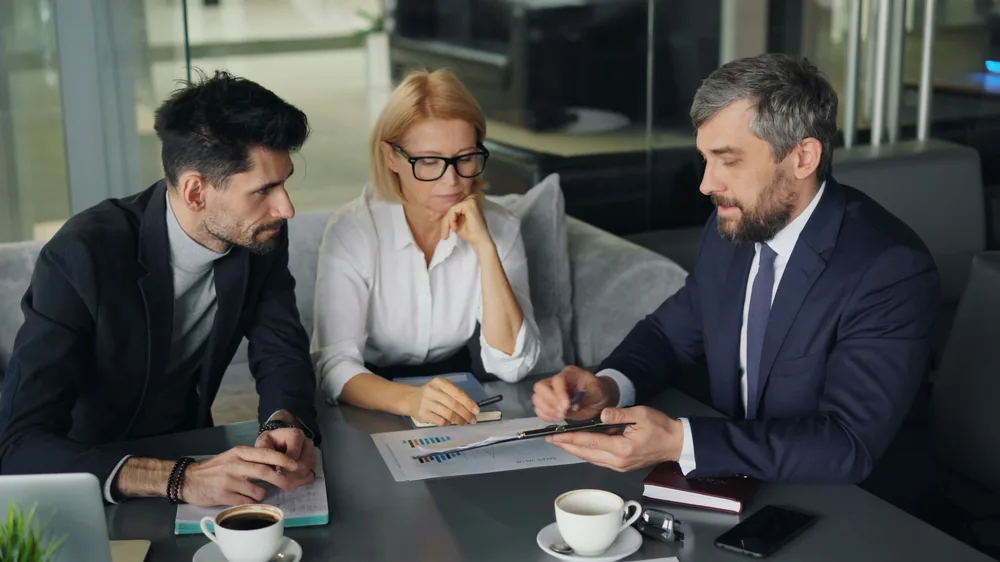 Attorney meeting with Houston business owners