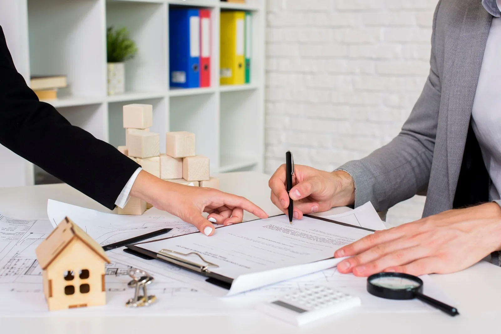 Attorneys reviewing real estate documents